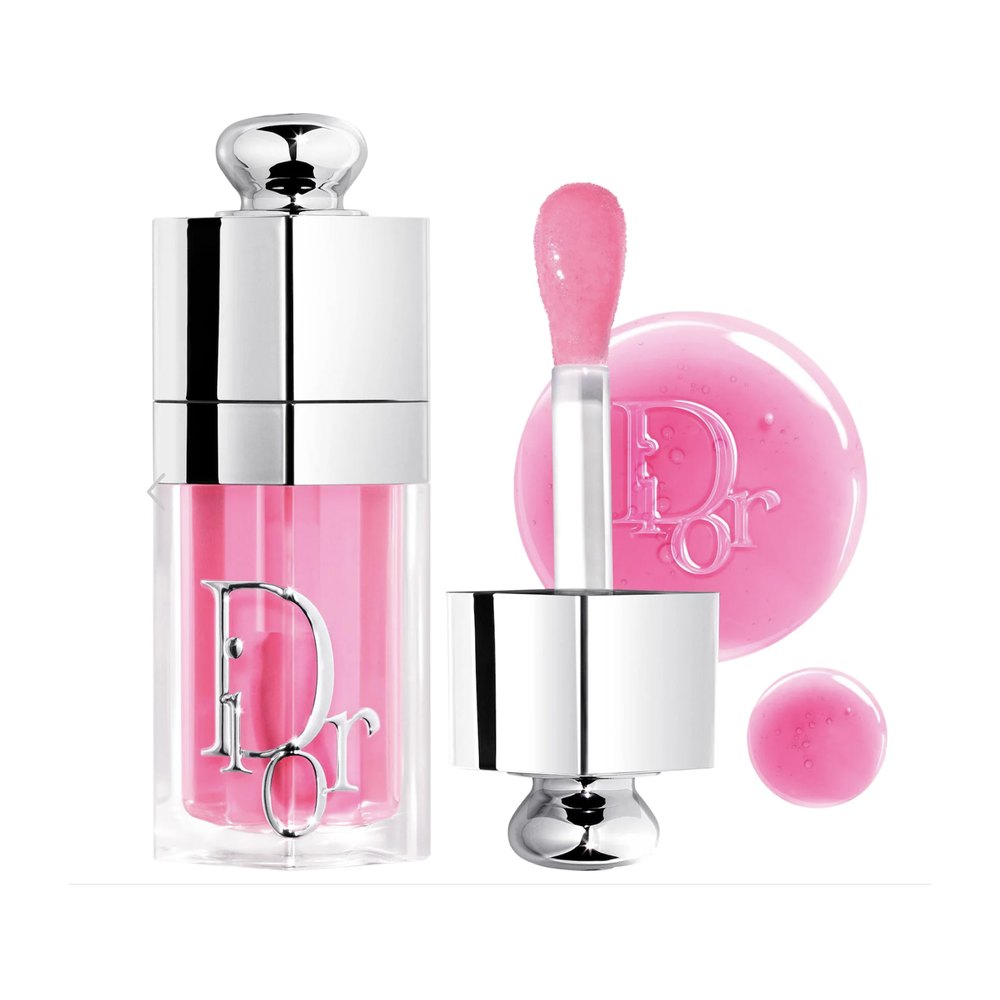 Aceite labial en frasco transparente con aplicador y muestra del producto